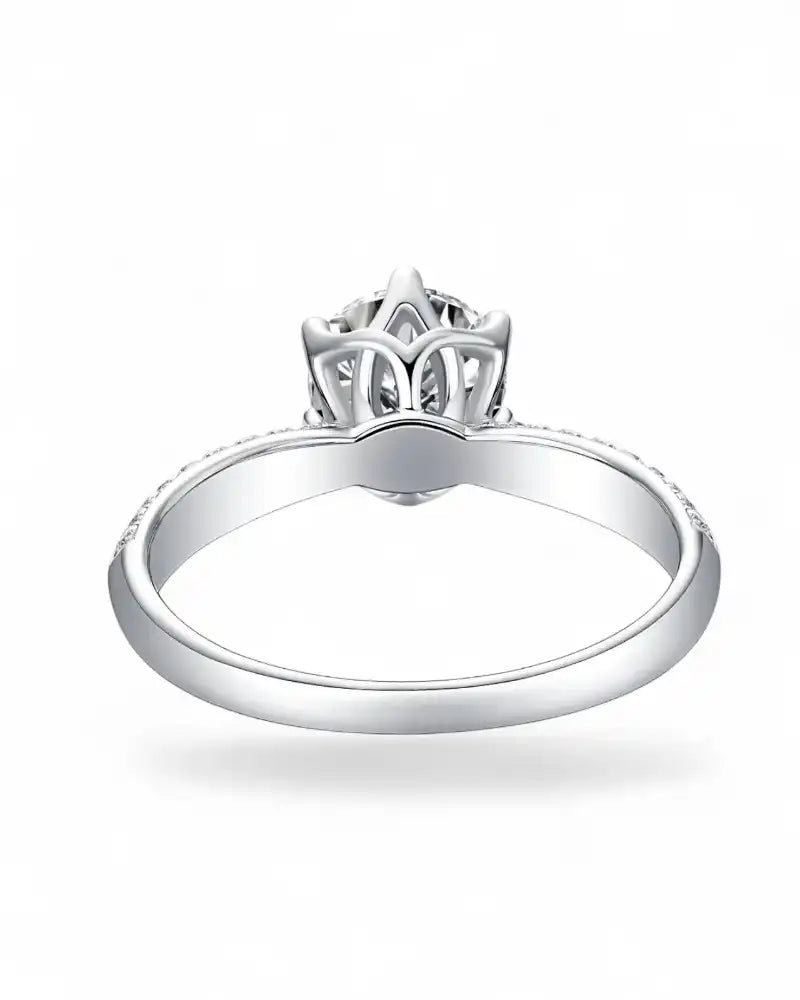 Moissanite engagement ring in silver with intricate floral crown setting