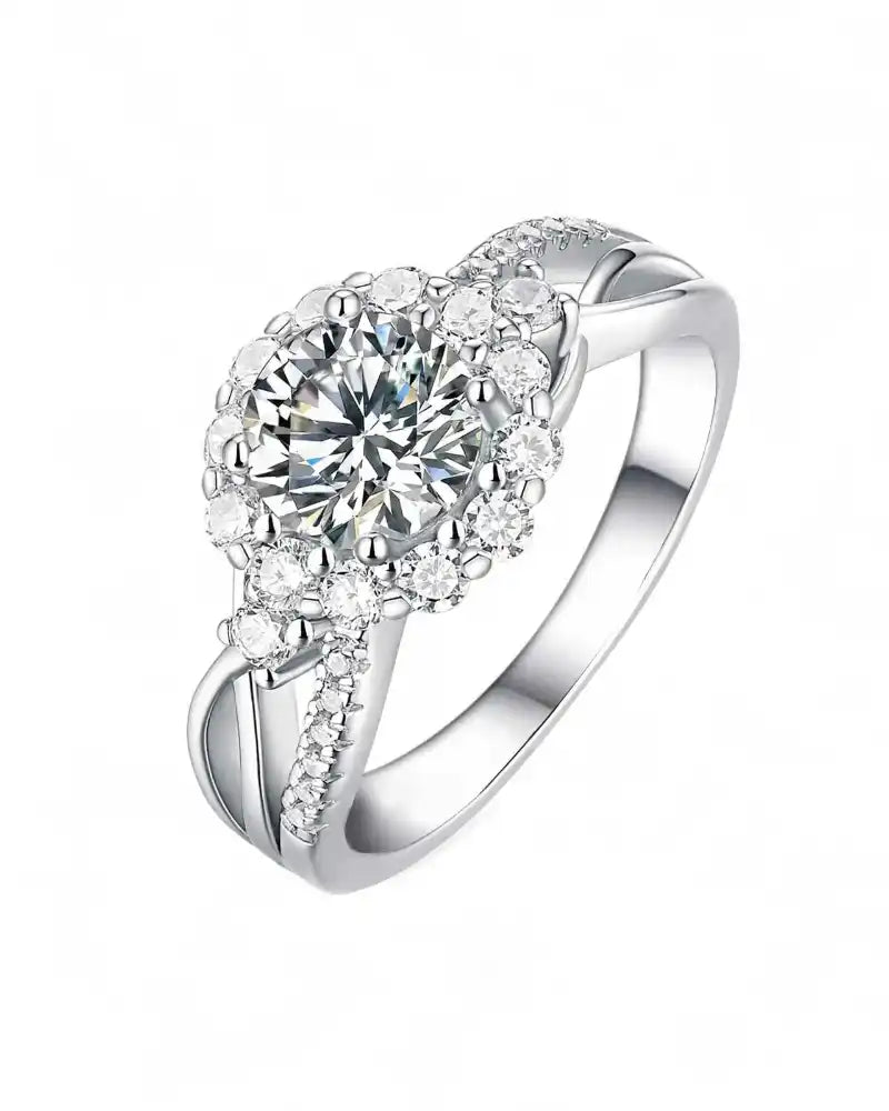 Silver moissanite halo engagement ring with round center stone and pavé band