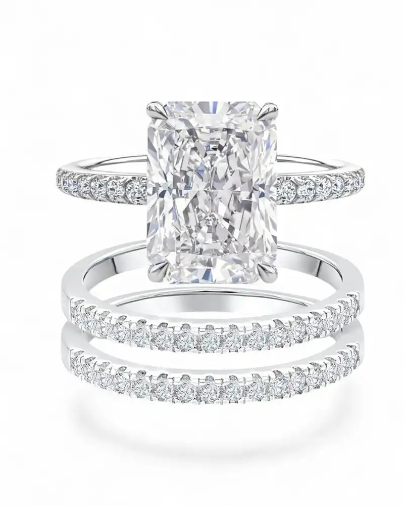 Radiant cut moissanite engagement ring set with pavé bands in white gold