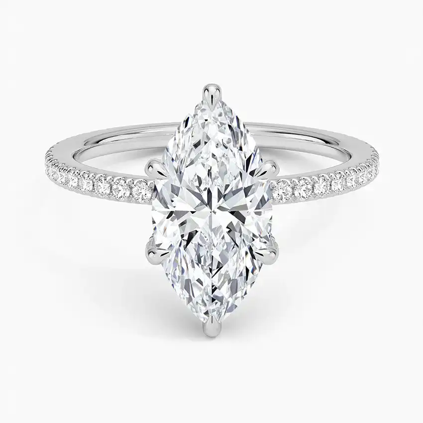 Marquise cut moissanite engagement ring with pavé diamond band on white background