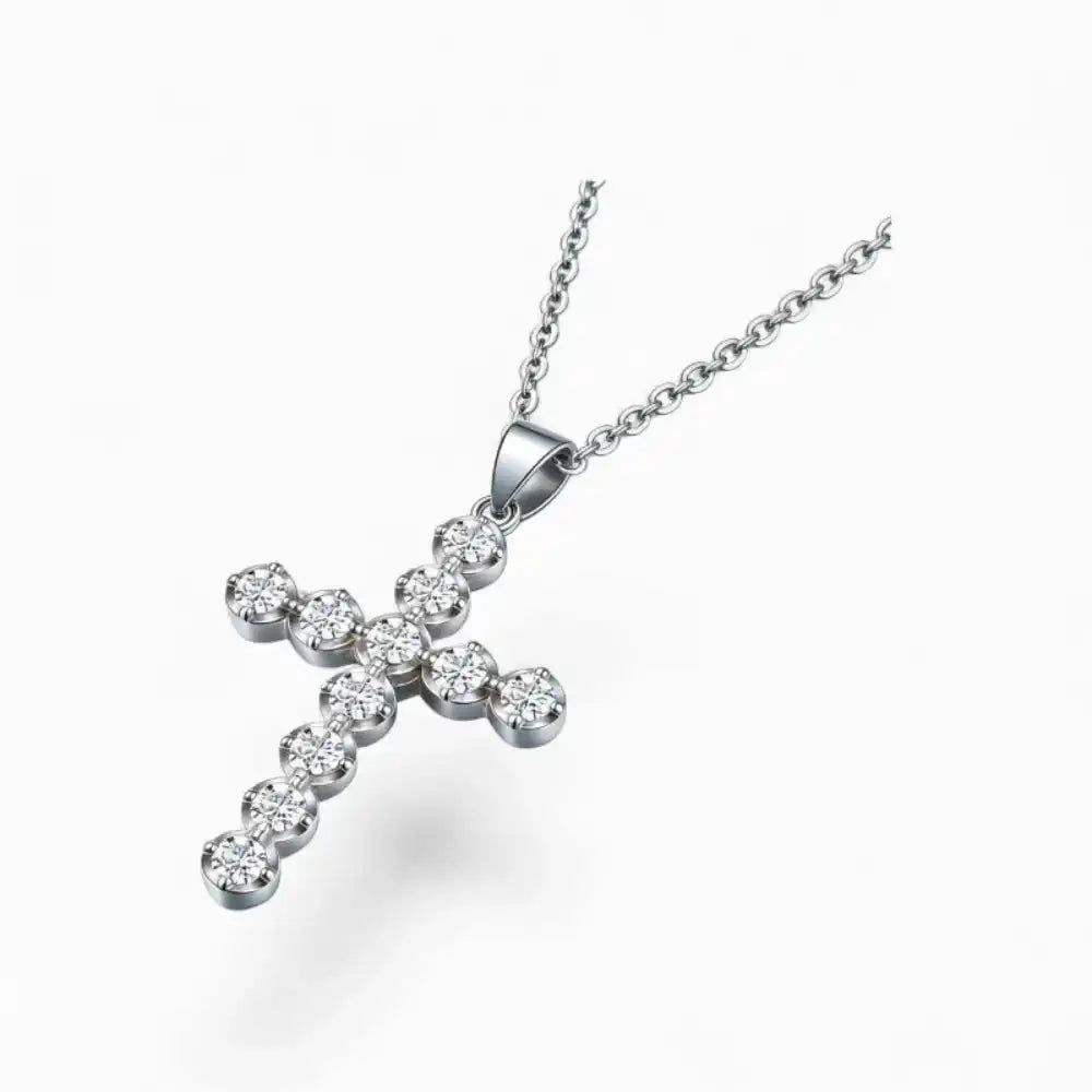 Moissanite cross pendant necklace with round stones in a silver setting on white background