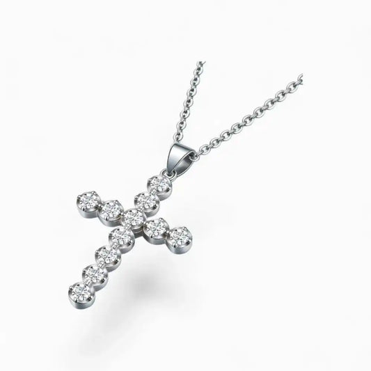 Moissanite cross pendant necklace with round stones in a silver setting on white background