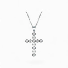 Moissanite cross pendant necklace in silver with round brilliant stones on cable chain