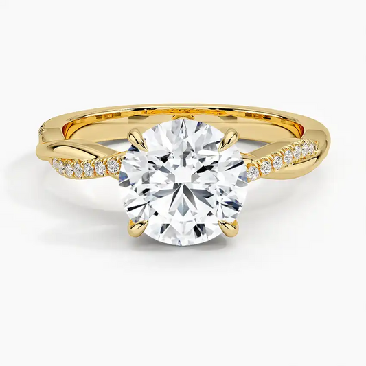 Yellow gold moissanite engagement ring with round brilliant center stone and pavé band