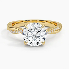 Yellow gold moissanite engagement ring with round brilliant center stone and pavé band