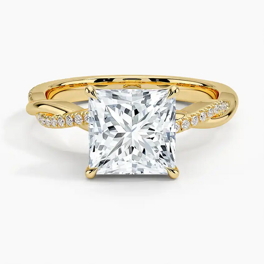 Princess cut moissanite engagement ring with gold band and pavé accent stones