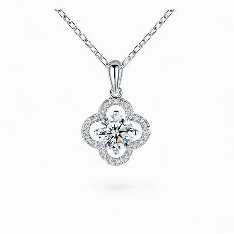 Moissanite flower pendant necklace in white gold with round center stone and pavé accents