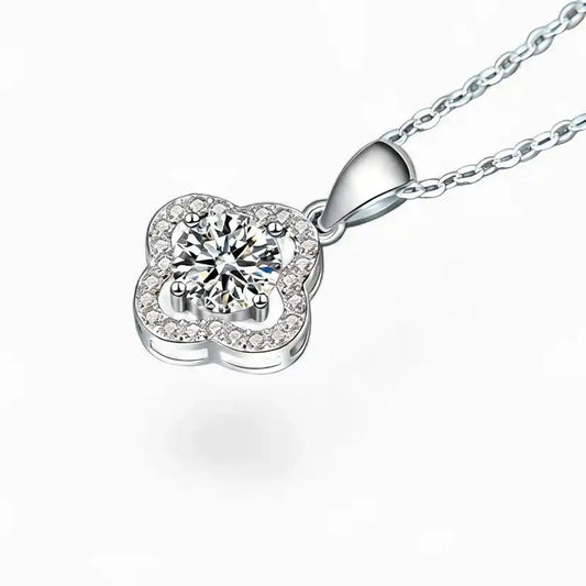 Moissanite flower pendant necklace with pavé halo on silver chain, luxury jewelry