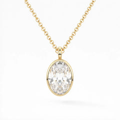 Oval cut moissanite pendant on gold chain, sparkling ethical gemstone jewelry