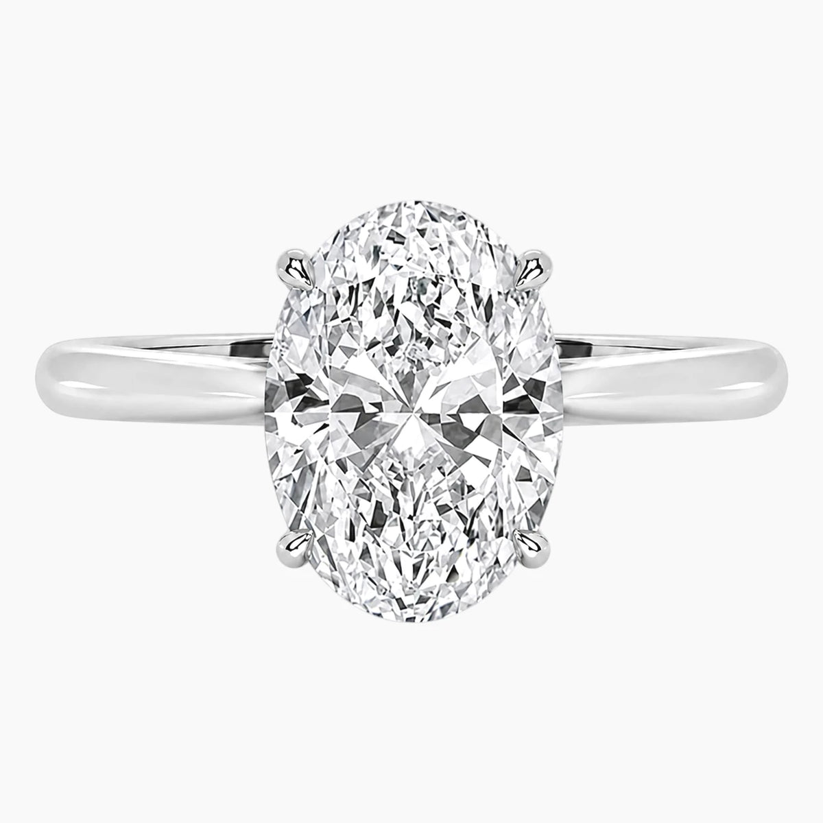 Amélie Écla 2 Carat Oval Cut Moissanite Hidden Halo Tapered Shank Ring