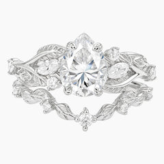 Enchanted Laurel Pear Cut Moissanite Botanical Bridal Set