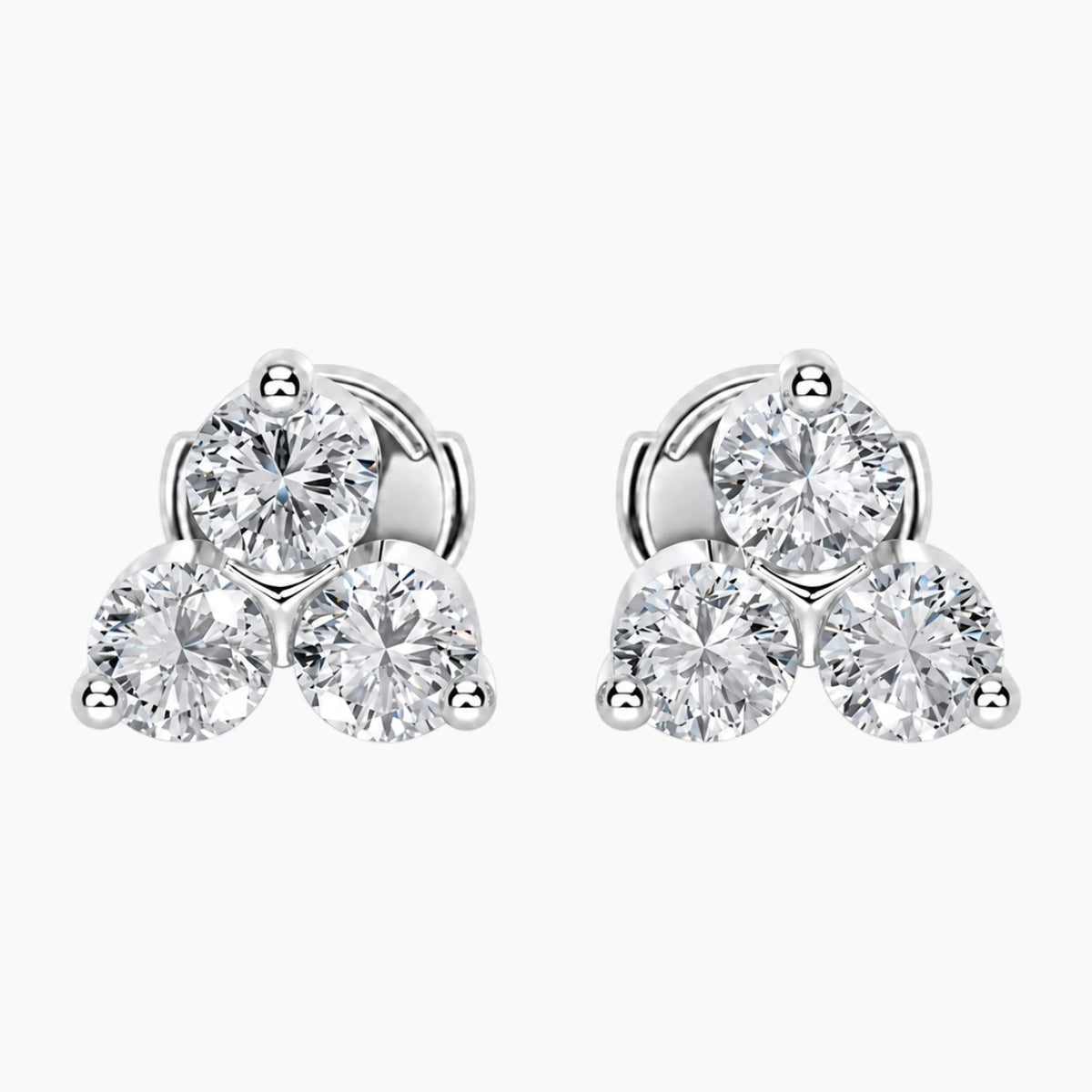 Aurellisse Round Three-Stone Moissanite Stud Earrings