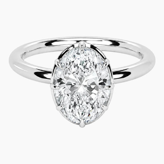 Émbrienne Oval Claw-Set Moissanite Ring