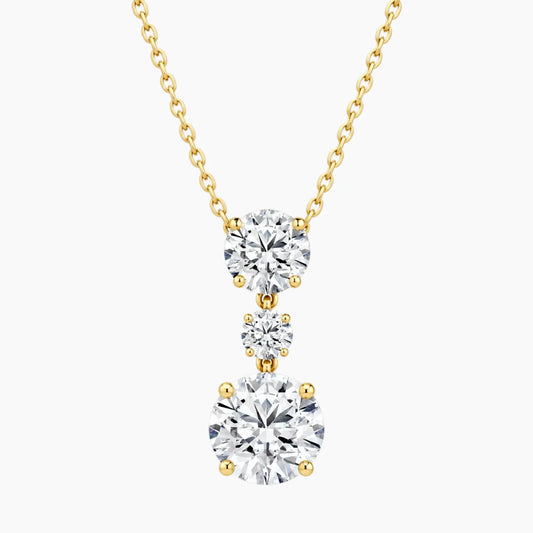 Élarienne Graduated Round Three-Stone Moissanite Drop Necklace
