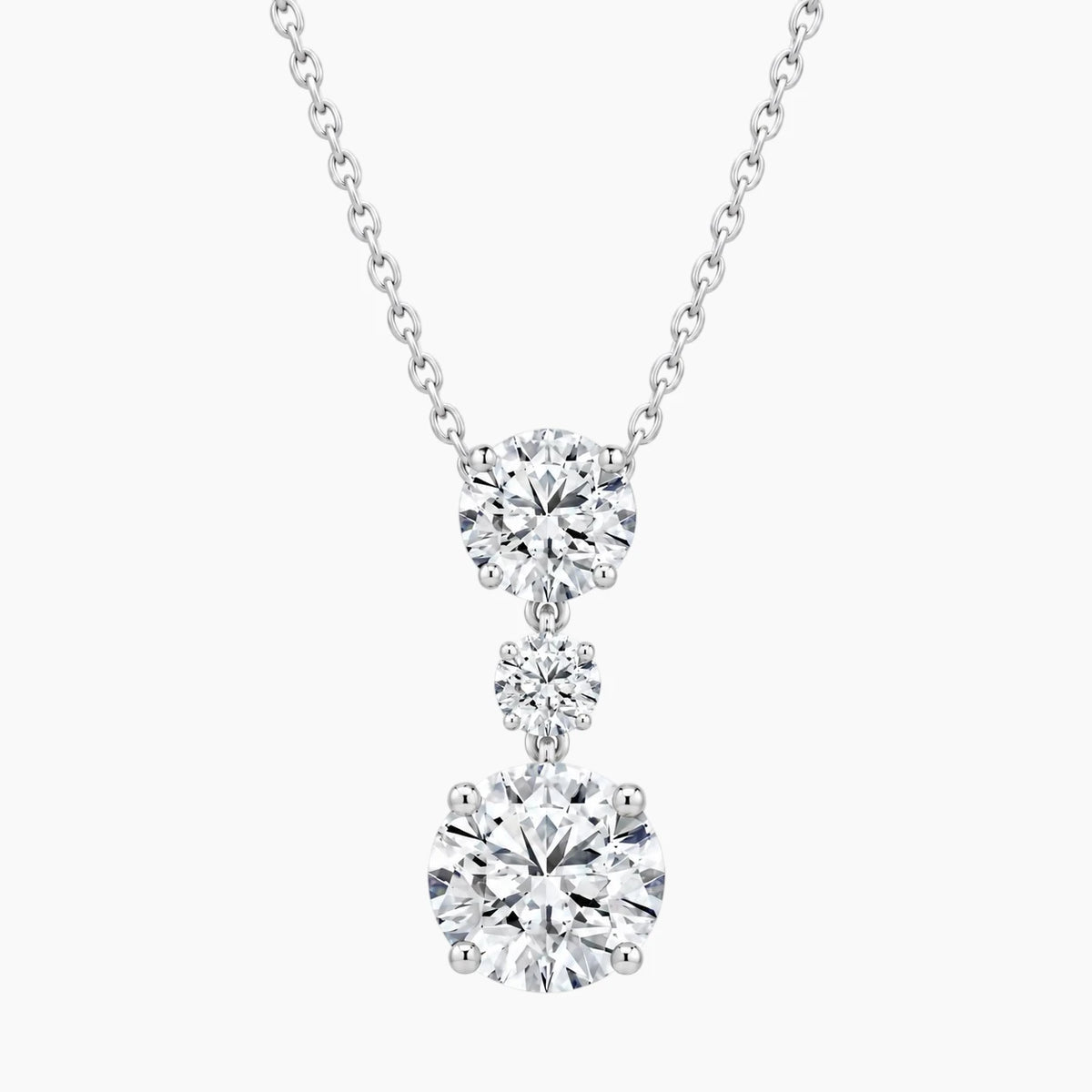 Élarienne Graduated Round Three-Stone Moissanite Drop Necklace