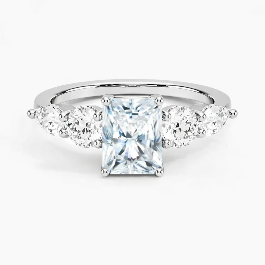 Radiant cut moissanite engagement ring with side stones in white gold setting