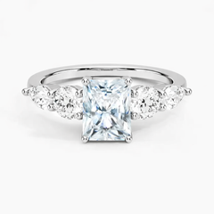 Radiant cut moissanite engagement ring with side stones in white gold setting