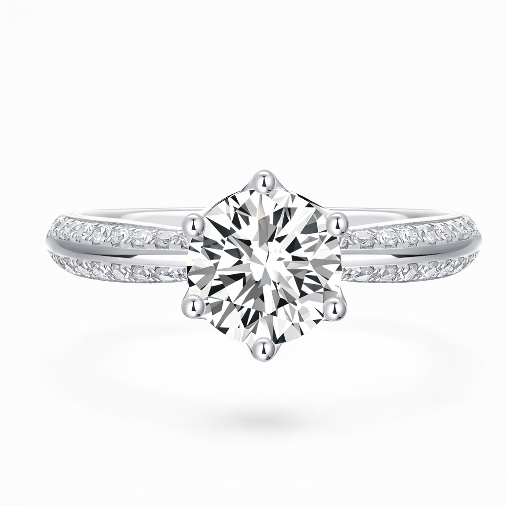 Round cut moissanite engagement ring with pavé band in white gold setting