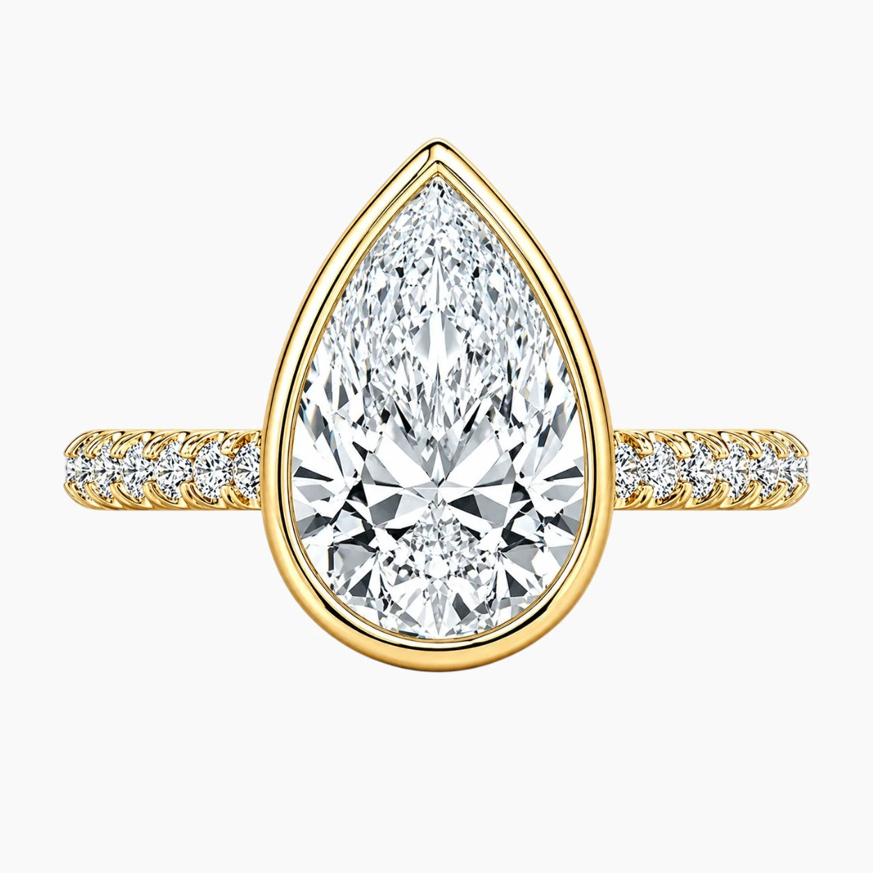 Yellow gold ring with pear-shaped moissanite center stone and pavé band