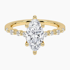 Marquise-cut moissanite ring featuring an 18K white gold-plated band set with pavé diamonds; an elegant solitaire-style engagement ring.
