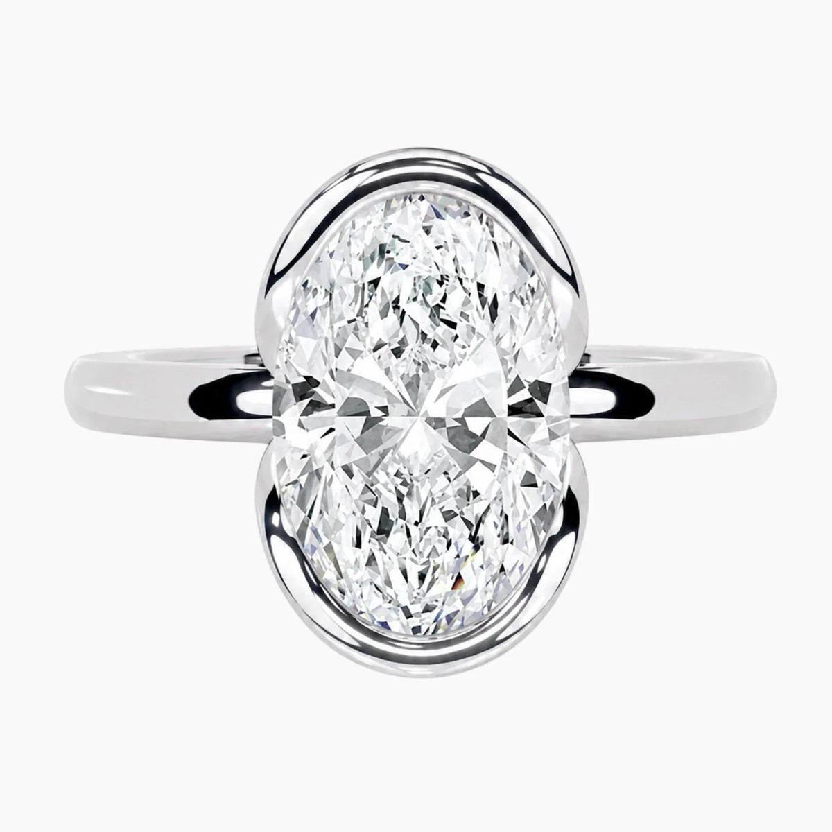 Half Bezel Oval Moissanite Ring