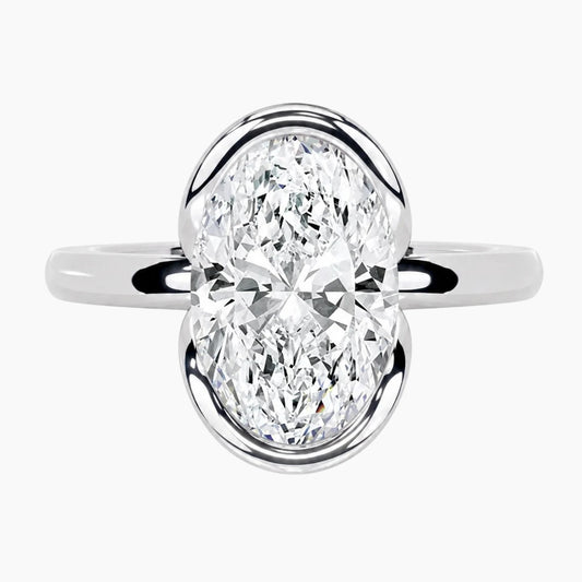 Half Bezel Oval Moissanite Ring