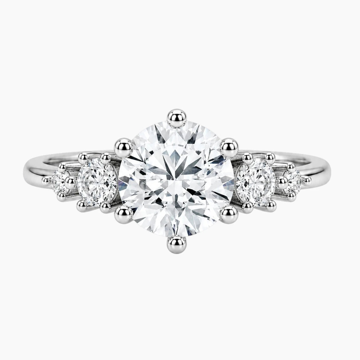 The Starlight Graduated Round Moissanite Five-Stone Ring