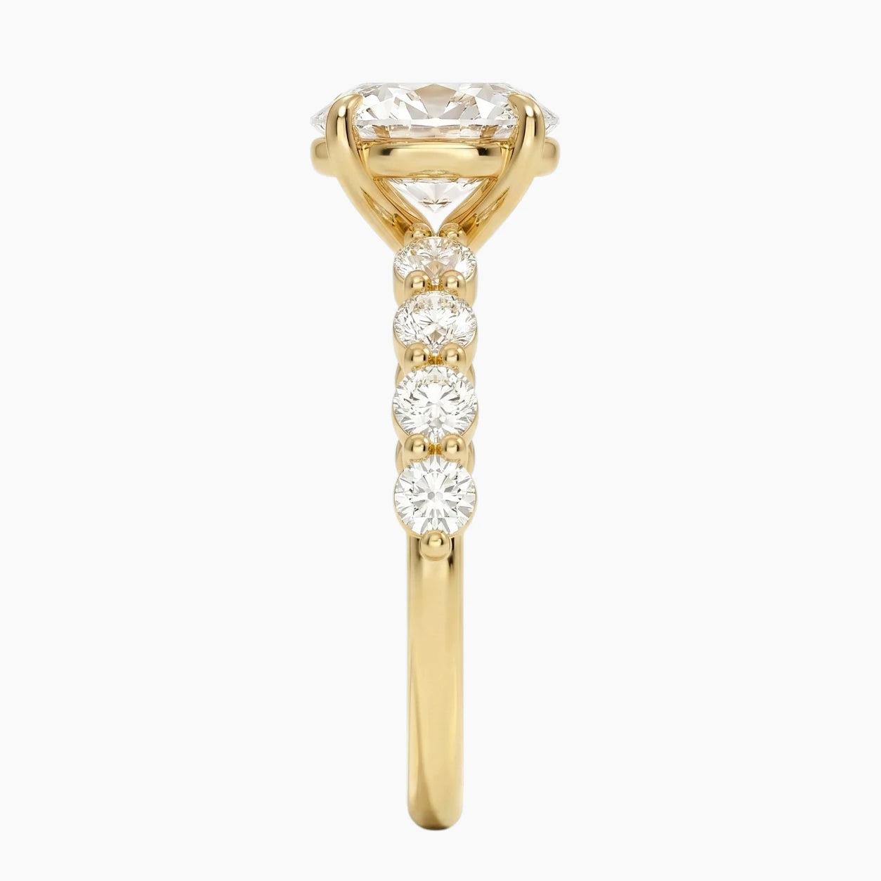 Oval-cut moissanite ring featuring an 18K white gold-plated band set with pavé diamonds; an elegant solitaire-style engagement ring.