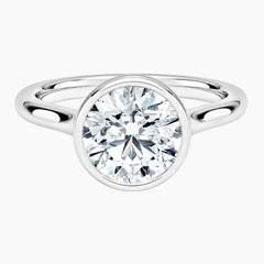 Modern Bezel-Set Round Moissanite Ring