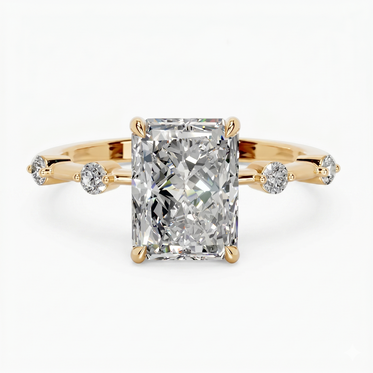 Radiant cut moissanite solitaire ring with gold band and side accent stones