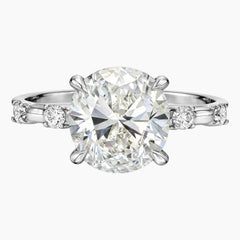 Oval moissanite engagement ring with side stones in white gold setting