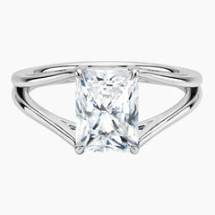 Radiant cut moissanite solitaire ring with split shank in polished silver setting
