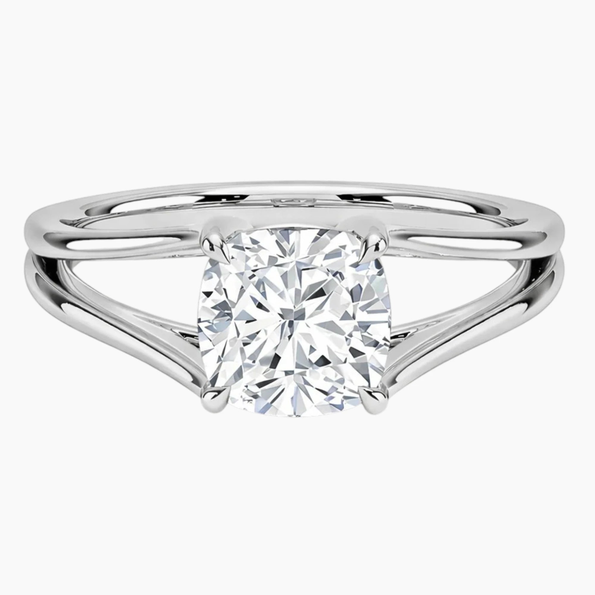 Cushion cut moissanite solitaire ring with split shank band in white metal
