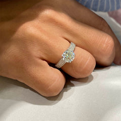 Classic 4-Prong Round Moissanite Solitaire Ring with Pavé Band