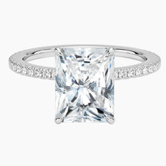 Radiant cut moissanite engagement ring with pavé band in white silver