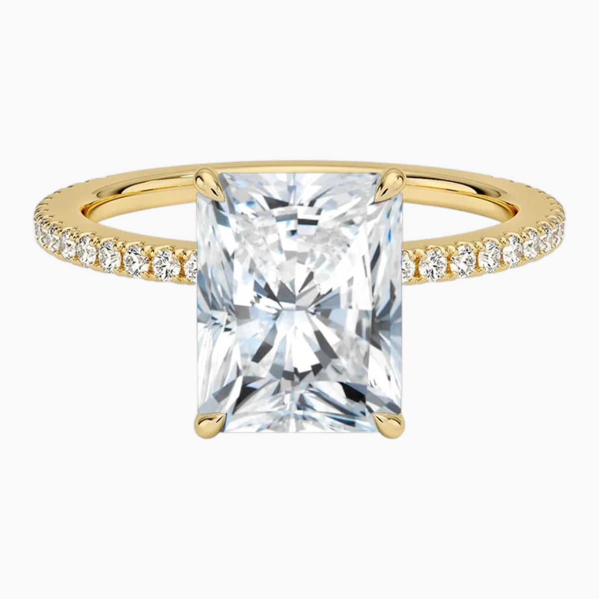 Radiant cut moissanite engagement ring with pavé band in white gold