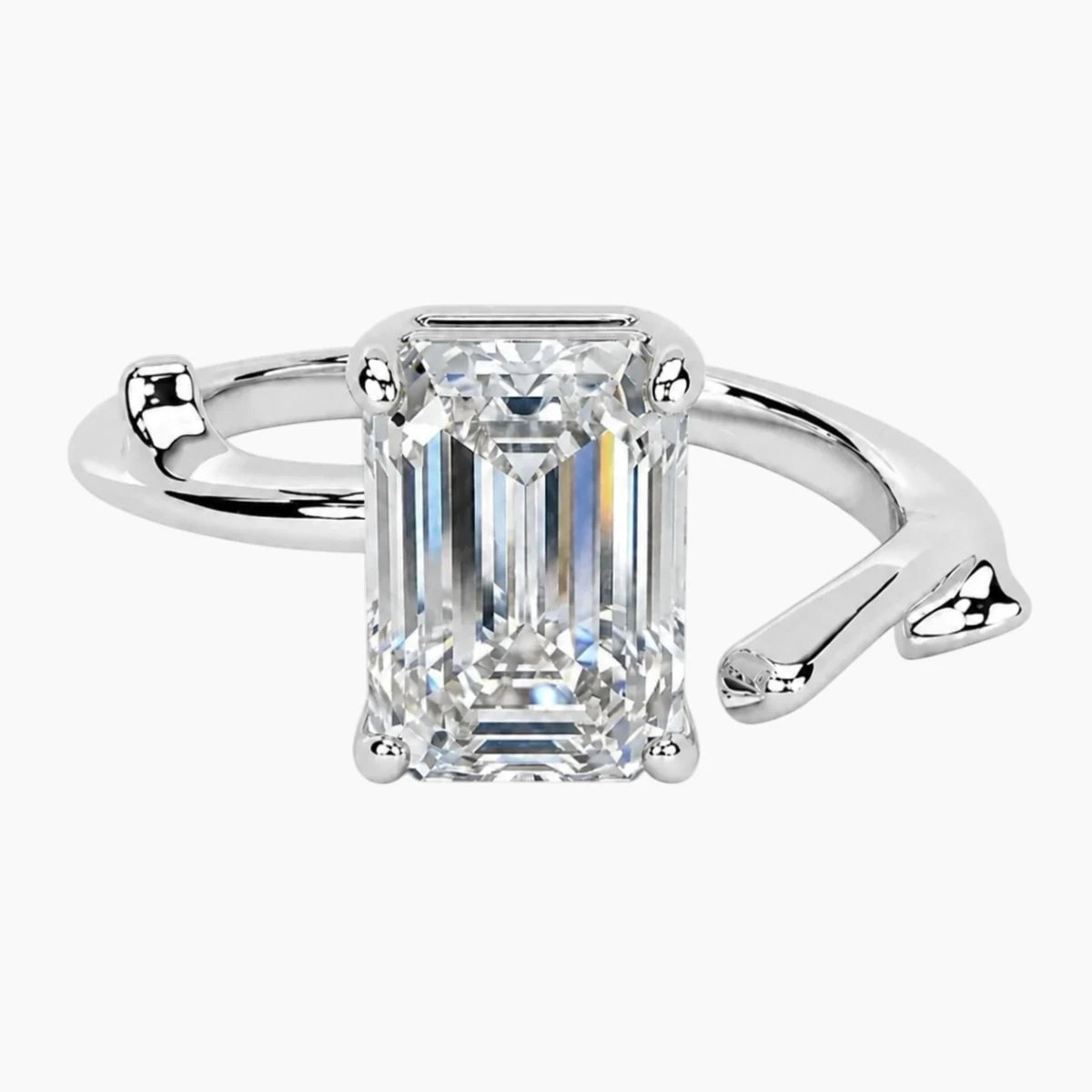 L'aura 2 Carat Emerald Cut Moissanite Open Bypass Ring
