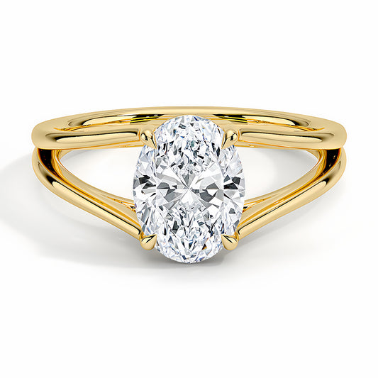 Oval cut moissanite solitaire ring with split shank yellow gold band