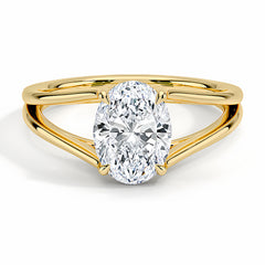 Oval cut moissanite solitaire ring with split shank yellow gold band