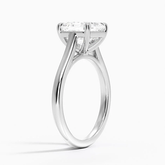Solitaire moissanite engagement ring with a round brilliant stone on a white gold band