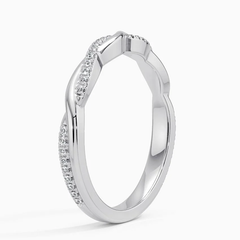 White gold moissanite wedding band with scalloped edge and pavé-set stones