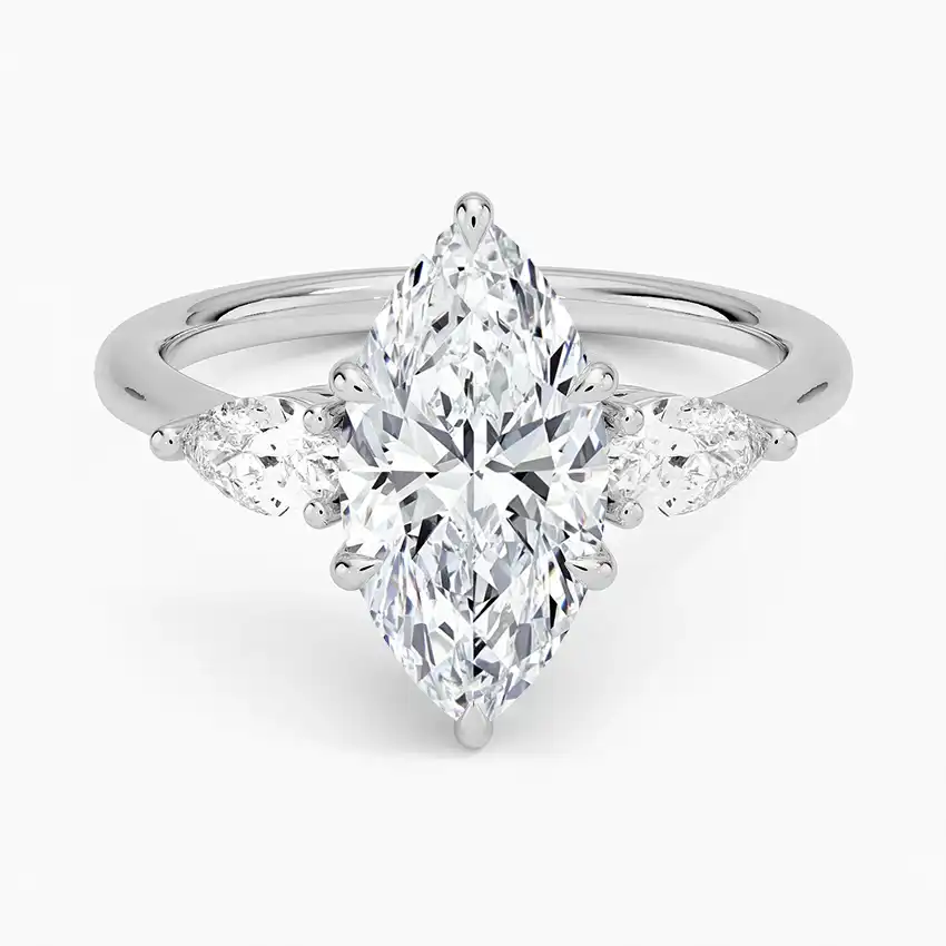 Marquise cut moissanite engagement ring with side stones in white gold setting
