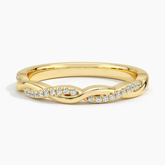 Gold twisted band moissanite ring with pavé-set stones, elegant and ethical fine jewelry