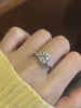 Opera Three Stone Oval Moissanite Ring