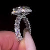 Classic Oval Halo Moissanite Engagement Ring with Pavé Band
