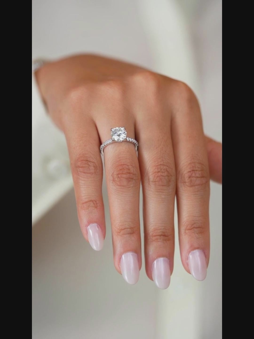 Brilliant Moissanite Solitaire Engagement Ring with Pavé Band
