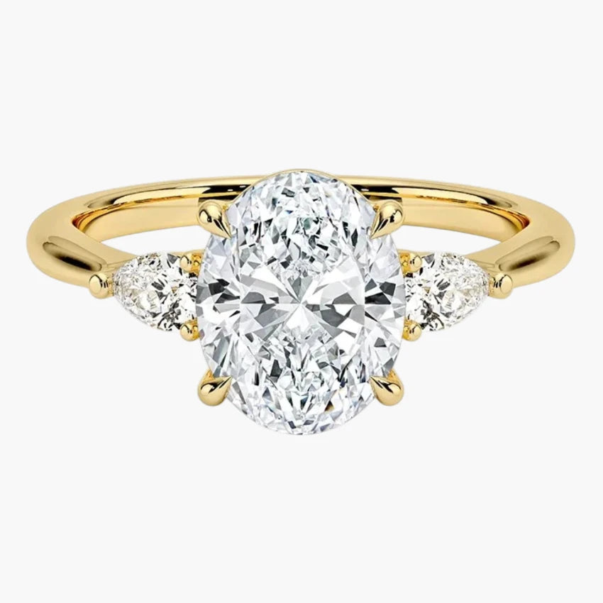 Luxury Oval Cut Moissanite Three-Stone Ring with Tapered Baguette Side Stones